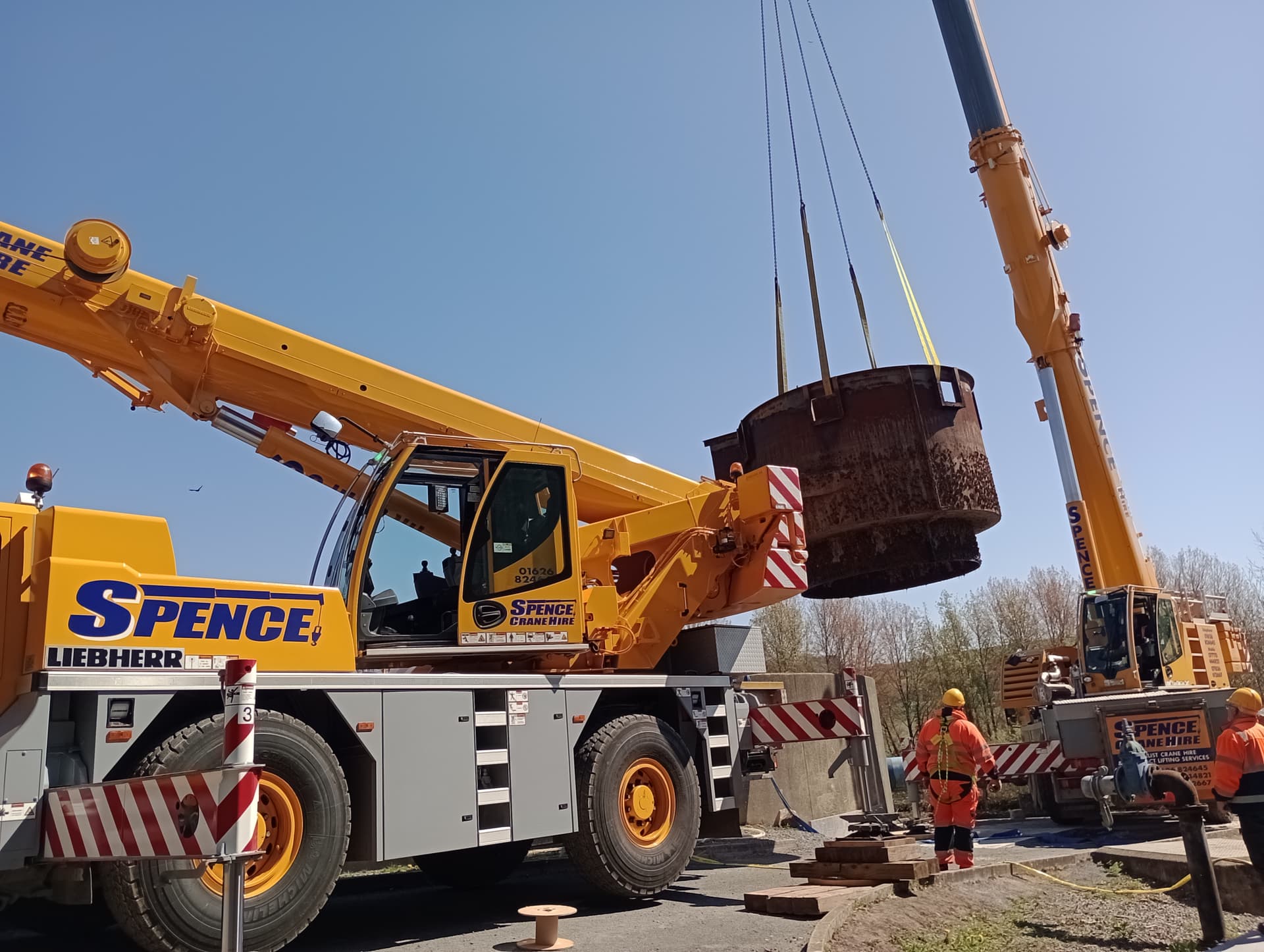 Twin crane lift removing a redundant steel tank
