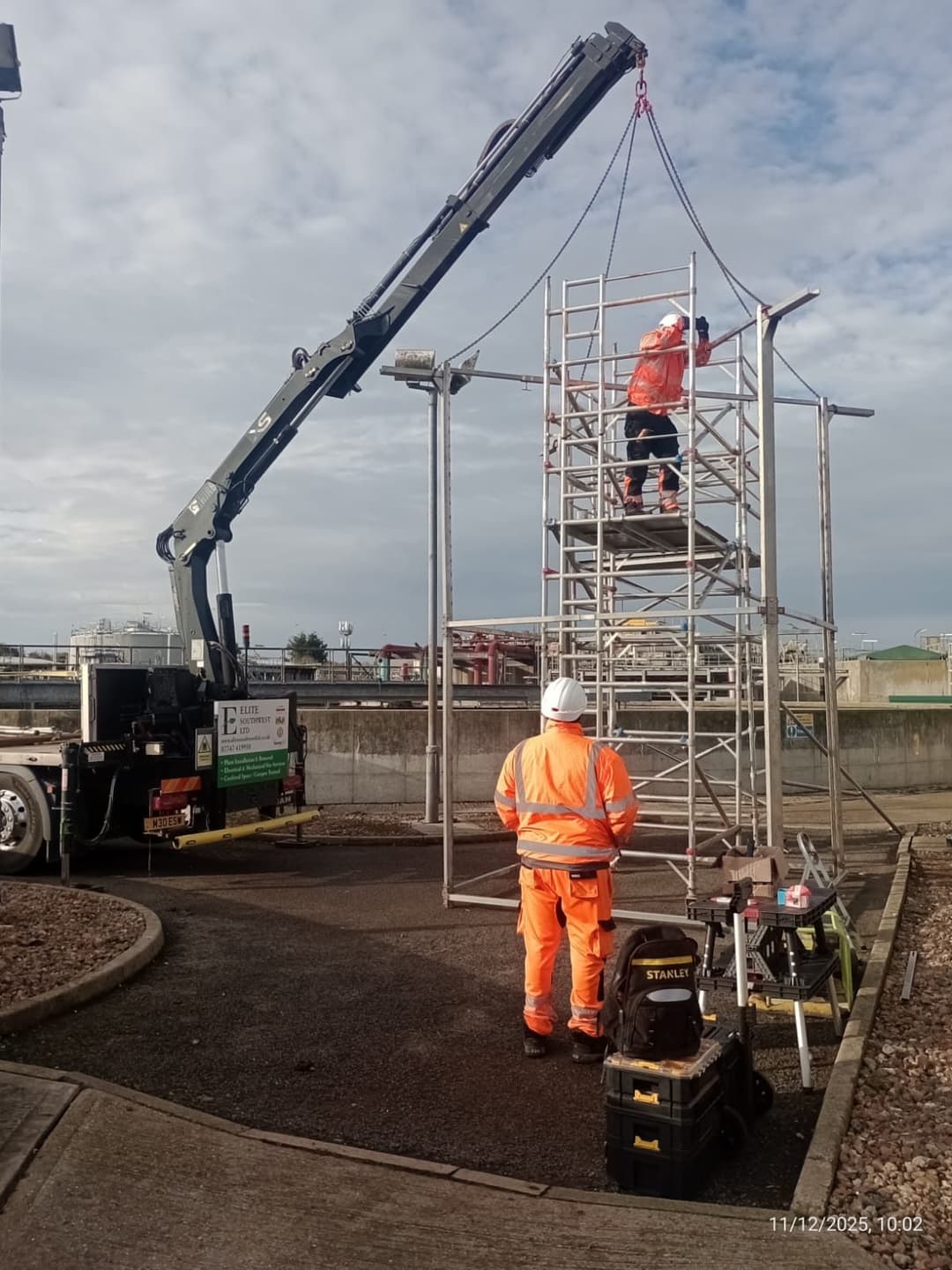 Hiab crane lifting on site