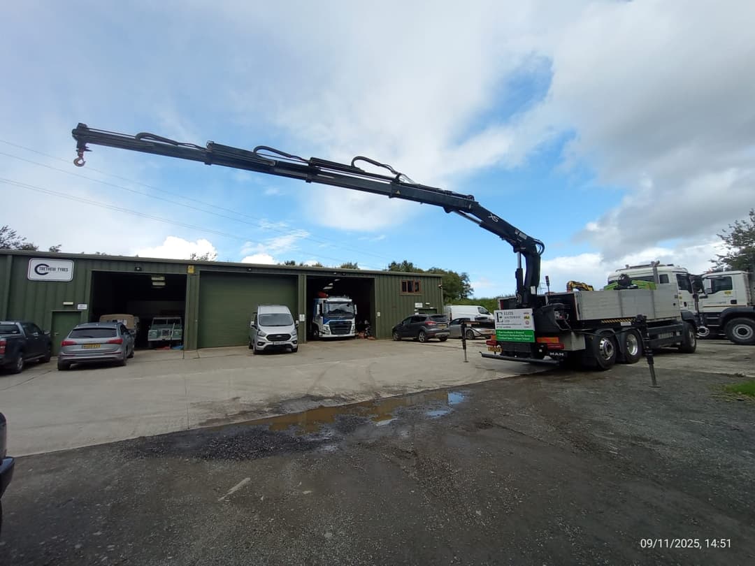 Hiab crane at reach on an industrial site
